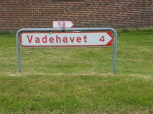 Skilt med kilometerafstand til Vadehavet